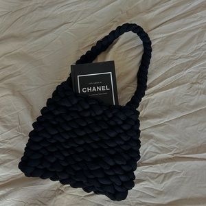 Hand-made black crochet bag with plush yarn